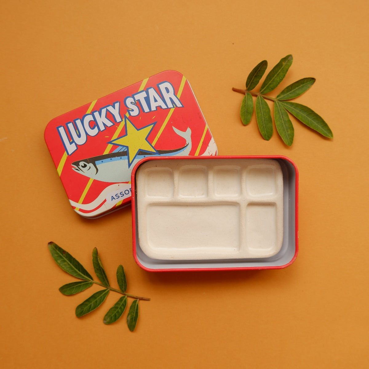 Lucky Star paint tin